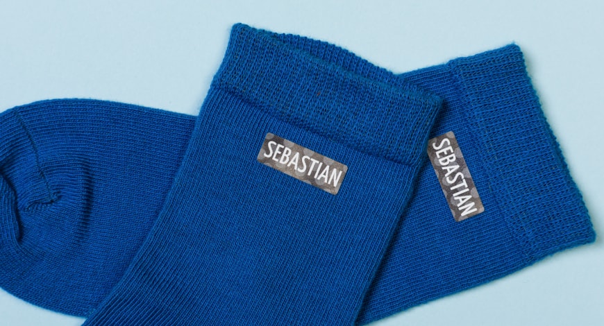 Kleidung etiketten handschuhe